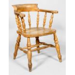 An ash tub shaped Windsor kitchen armchair with turned baluster back rest and elm urned top rail,