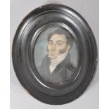 An early 19th century portrait miniature of a gentleman, watercolour on ivory,
