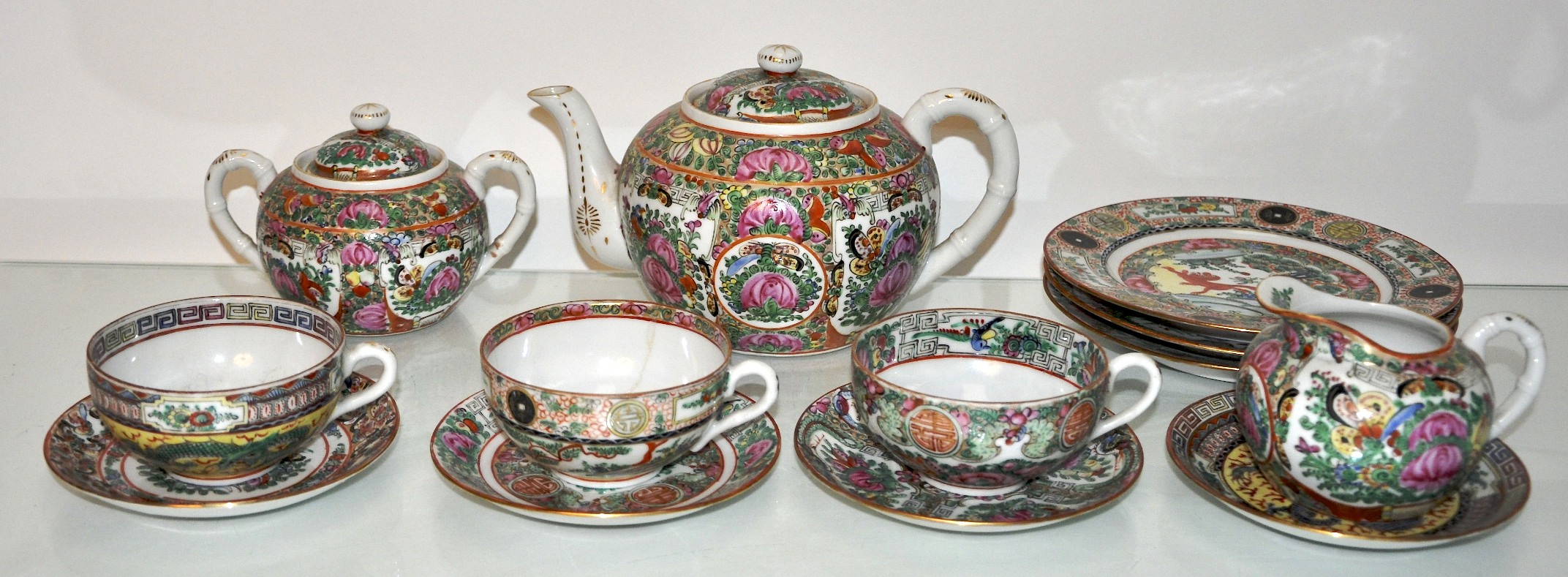 A china famille rose tea set and plates