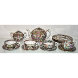 A china famille rose tea set and plates