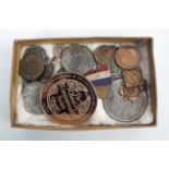 A collection of medals and coins to include Coronation commemoratives and Jubilee commemoratives