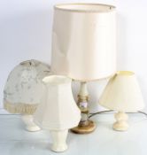 Three lamps in onyx and pottery