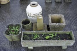 A garden planter and smaller planter with other pots Largest measuring at 50cm high and 37cm wide