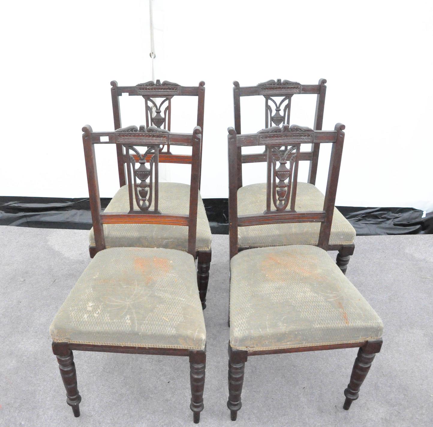 Four Edwardian mahogany chairs with vase splats