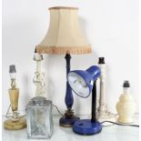 An alabaster table lamp and others in composite and metal