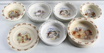 A group of nursery china bunnykins and Alice in wonderland