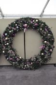 A large Christmas wreath 183cm wide