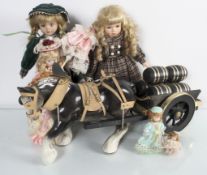 A Shire horse and cart, and three dolls