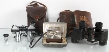 A pair of opera glasses, miniature radio and a pair of binoculars