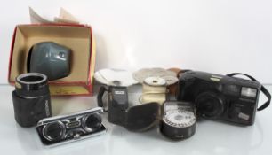 A slide projector and other photographic items to include a zoom camera and meters