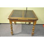 An oak draw leaf table with barley twist legs 76cmH x 90cmW x 90cmD