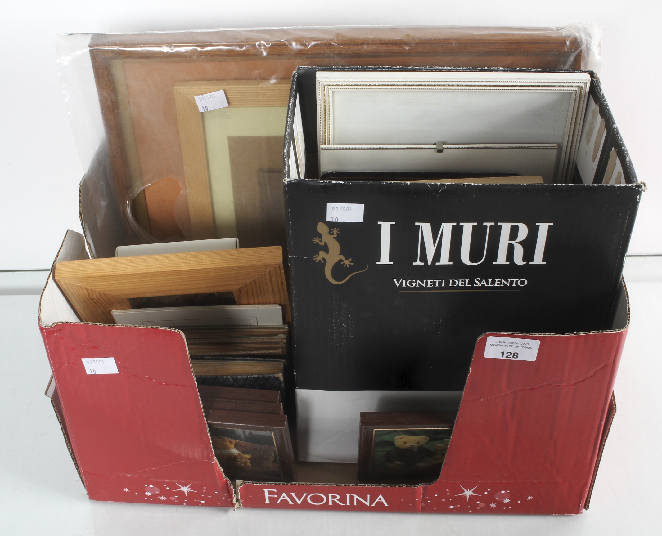 A box of frames in wood and two period photograph albums