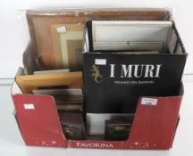 A box of frames in wood and two period photograph albums