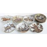 A group of wall plates the forest year by the collectors studio depicting wildlife 19cm
