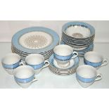 A china tea set with blue band and gilt decoration to include matching dinner plates