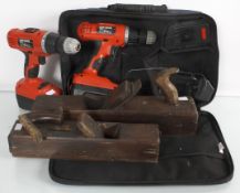 An 18volt Black & Decker drill with batteries and charger together with Bosch drill and planes