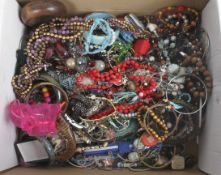 A mixed lot of costume jewellery to include watches,