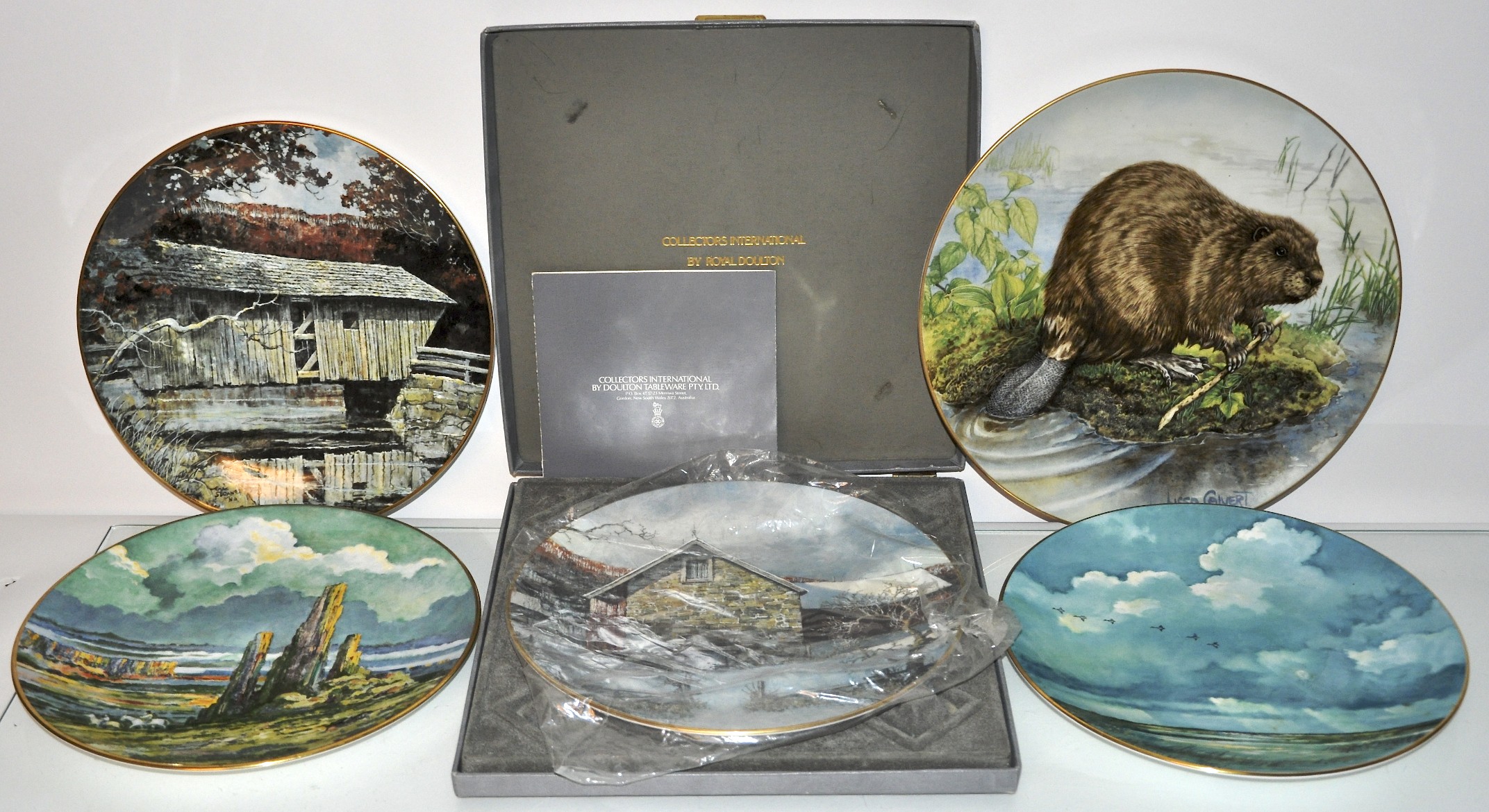 Four Doulton limited edition plates and 1 other (5)