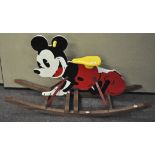 A Mickey Mouse rocking toy