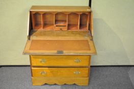 A pale oak bureau, early 20th century H 96cm, W 75cm,