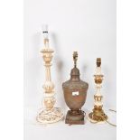 Three lamps, two paint and gilt and an urn