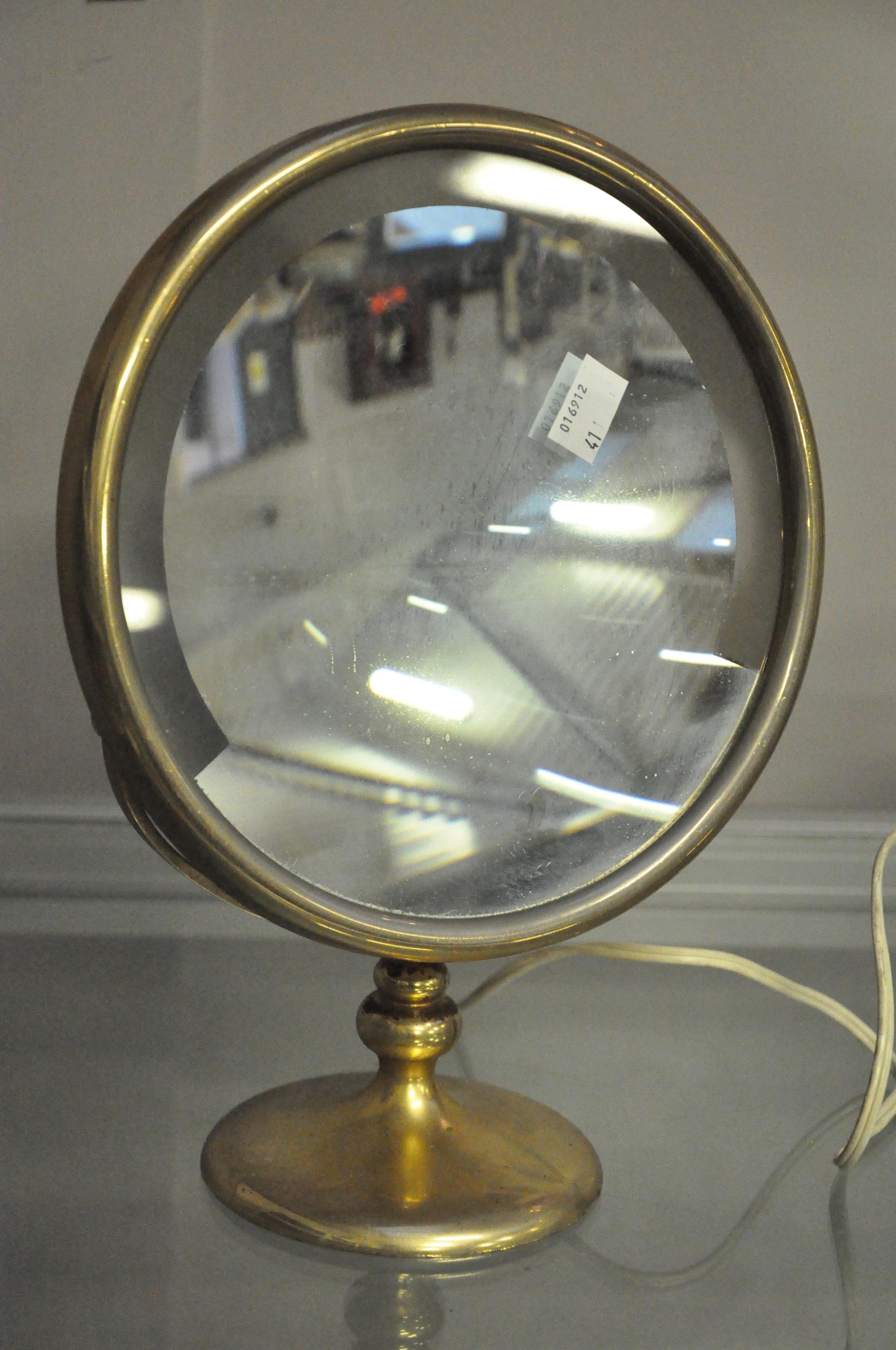 Two vanity mirrors together with display boxes for Cartier,