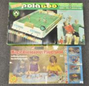 A boxed Magic Roundabout game and a pola 600 table football game