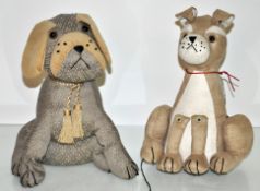 Two dog fabric doorstops