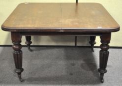 A 19th century mahogany dining table 71cm x 124cm x 120cm