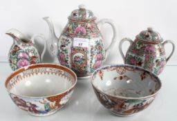 A famille rose style three piece tea set and two Chinese bowl one in the faille rose palette