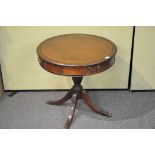 A mahogany round library style occasional table with leather top 71cmH x 71cmW