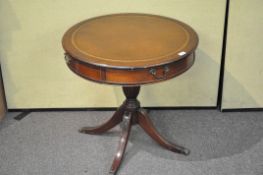 A mahogany round library style occasional table with leather top 71cmH x 71cmW