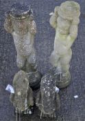Two stone figures, 68 cm high, together with two pelicans,