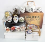 A boxed Chinese tea set, napkin rings,