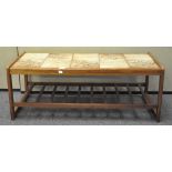 A tile topped coffee table 40cmH x 105cmW x 47cmD