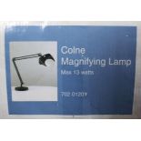 A boxed, John Lewis new "Colne" magnifying lamp