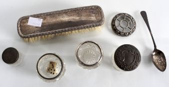 A selection of silver items to include a clothes brush and salts