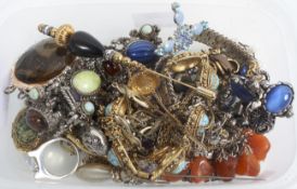 A mixed lot of costume jewellery to include a hat pin
