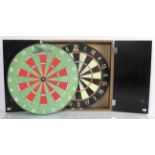 Two dart boards and some darts