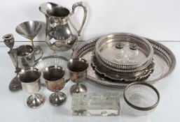 A quantity of silver plate to include two salvers and a water jug