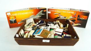 Two model aircraft and a collection of matches