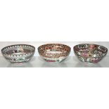 Three Oriental famille rose bowls 23 cm wide