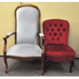 An armchair and another upholstered in blue and red velvet respectively
