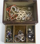 A collection of vintage silver jewellery in a crocodile skin box