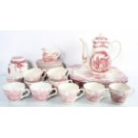 A quantity of pink 'Willow' pattern Ironstone china