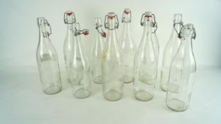 A quantity of lidded bottles