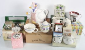 A group of boxed mugs