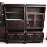 A glazed cabinet and another with shelves each 186 cm high 87 cm wide