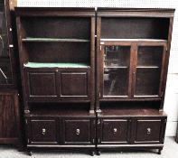 A glazed cabinet and another with shelves each 186 cm high 87 cm wide