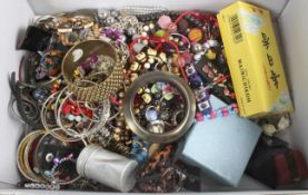 A mixed lot of costume jewellery to include bangles